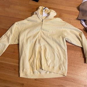 Yellow hoodie from Hollister. Very soft with full length zipper.